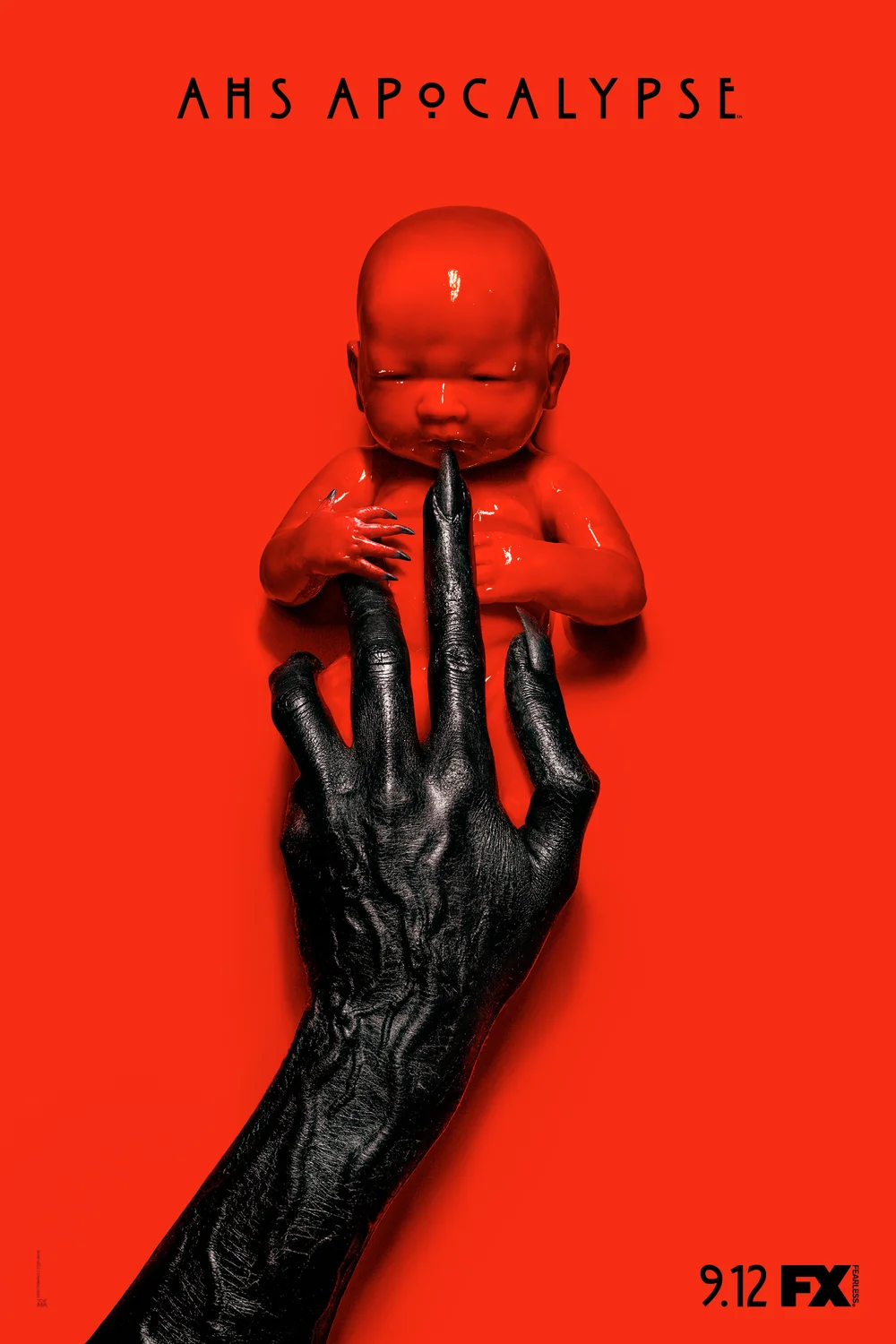 Official FX key art for American Horror Story: Apocalypse, showing a demonic black hand cradling a red-lit infant against a red background.