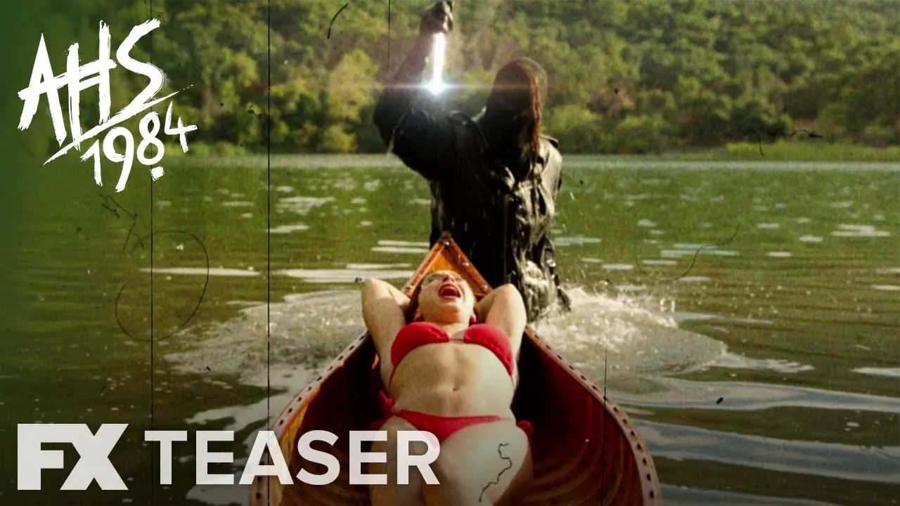 Two Camp Redwood characters ride a canoe on a lake beneath the AHS 1984 and FX teaser logos.