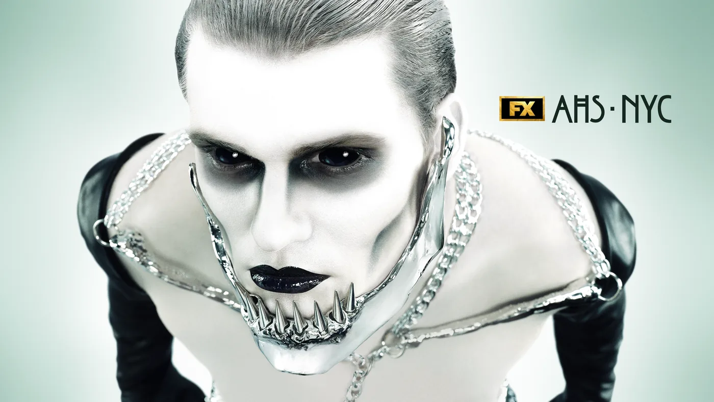 A pale figure wearing black lipstick and a metallic jaw piece appears beside the FX AHS: NYC logo in official key art.