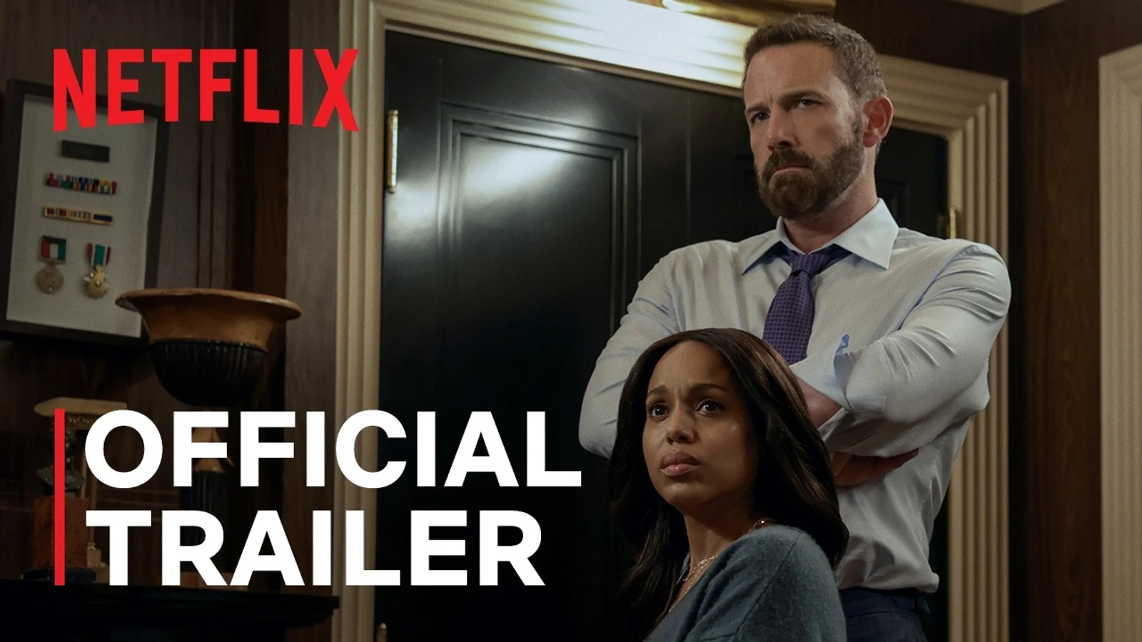 Official Netflix trailer still of Ben Affleck as Mark Kimball standing behind a seated, worried Kerry Washington as Abigail Kimball in their home.