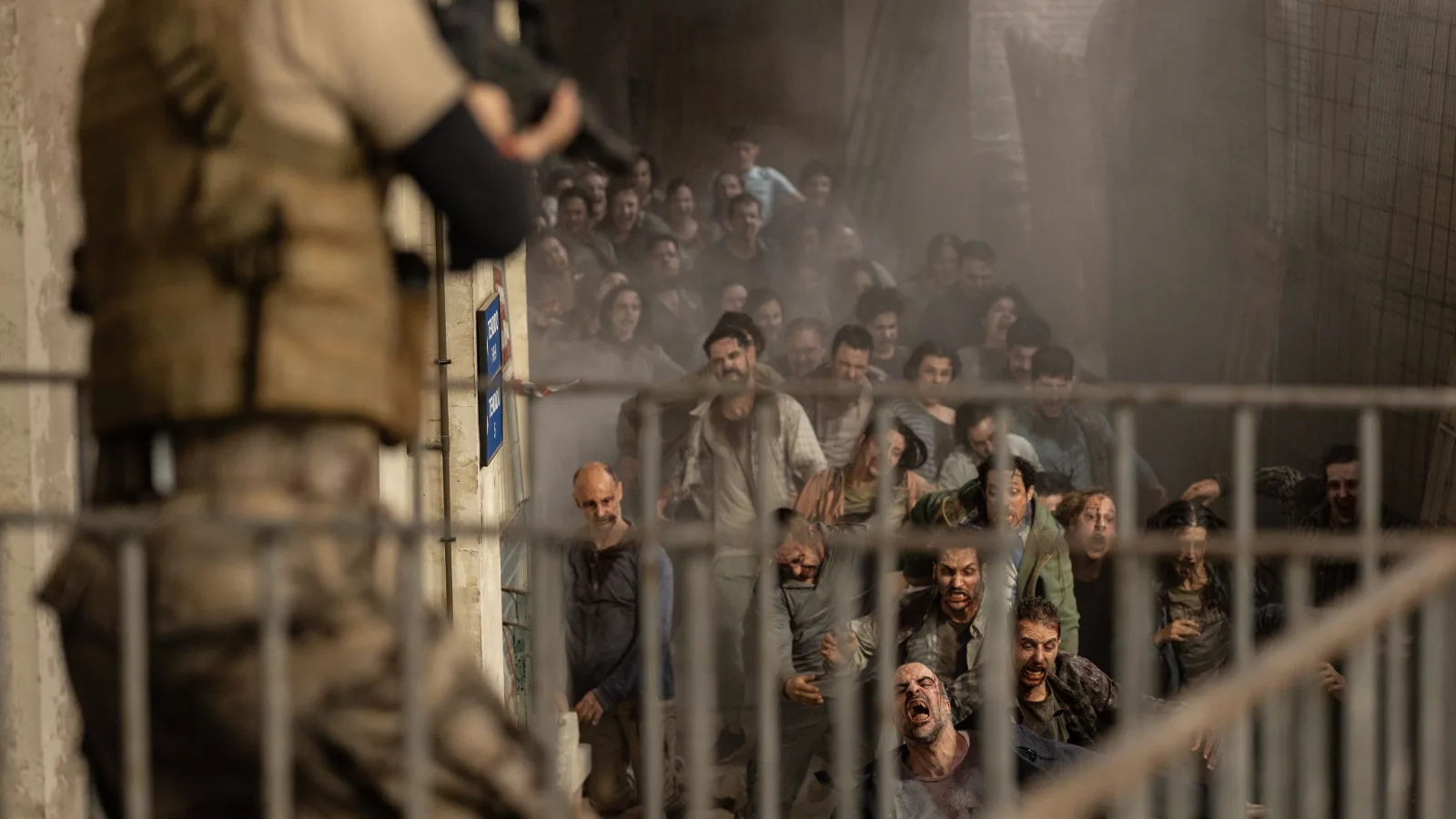 Prime Video / Amazon MGM Studios A group of infected crowded into a stairwell in an official Apocalypse Z: New World still.