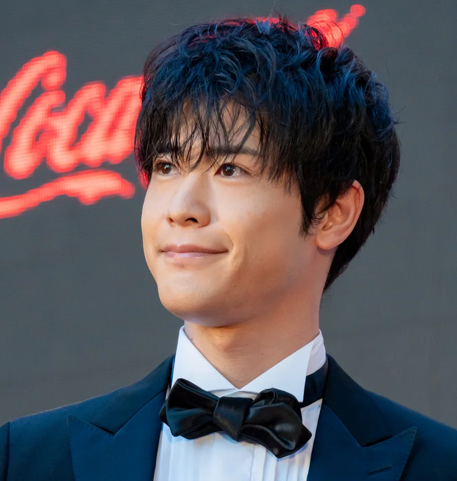 Takeo Otsuka in a dark suit and bow tie at the 2023 Tokyo International Film Festival.