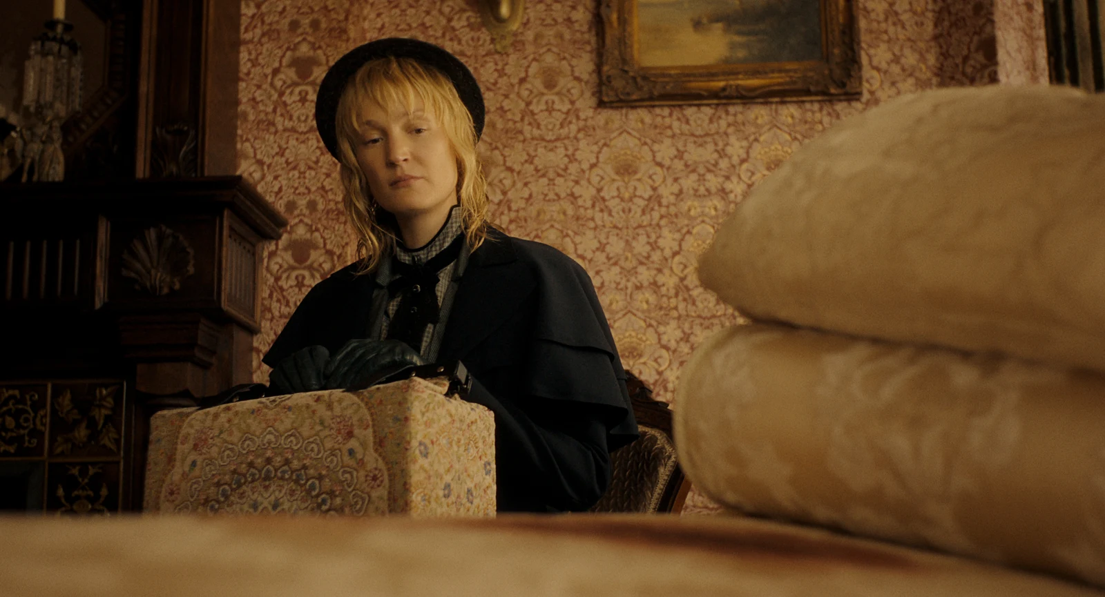 Vicky Krieps as Bridget 'Maggie' Sullivan arriving at the Borden house in Netflix's Monster: The Lizzie Borden Story.