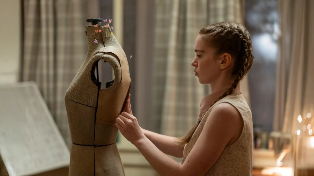 Carrie White carefully placing pins into a dress form at home in the 2026 Prime Video series.