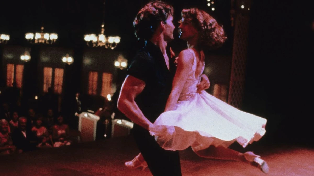 Patrick Swayze as Johnny Castle holds Jennifer Grey as Baby Houseman during a dance in Dirty Dancing (1987).