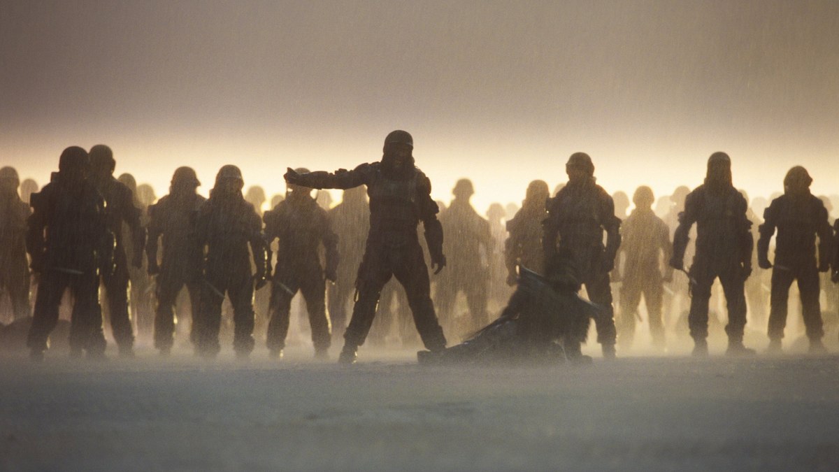 A crowd gathered in the aftermath of violence in Dune: Part Three.