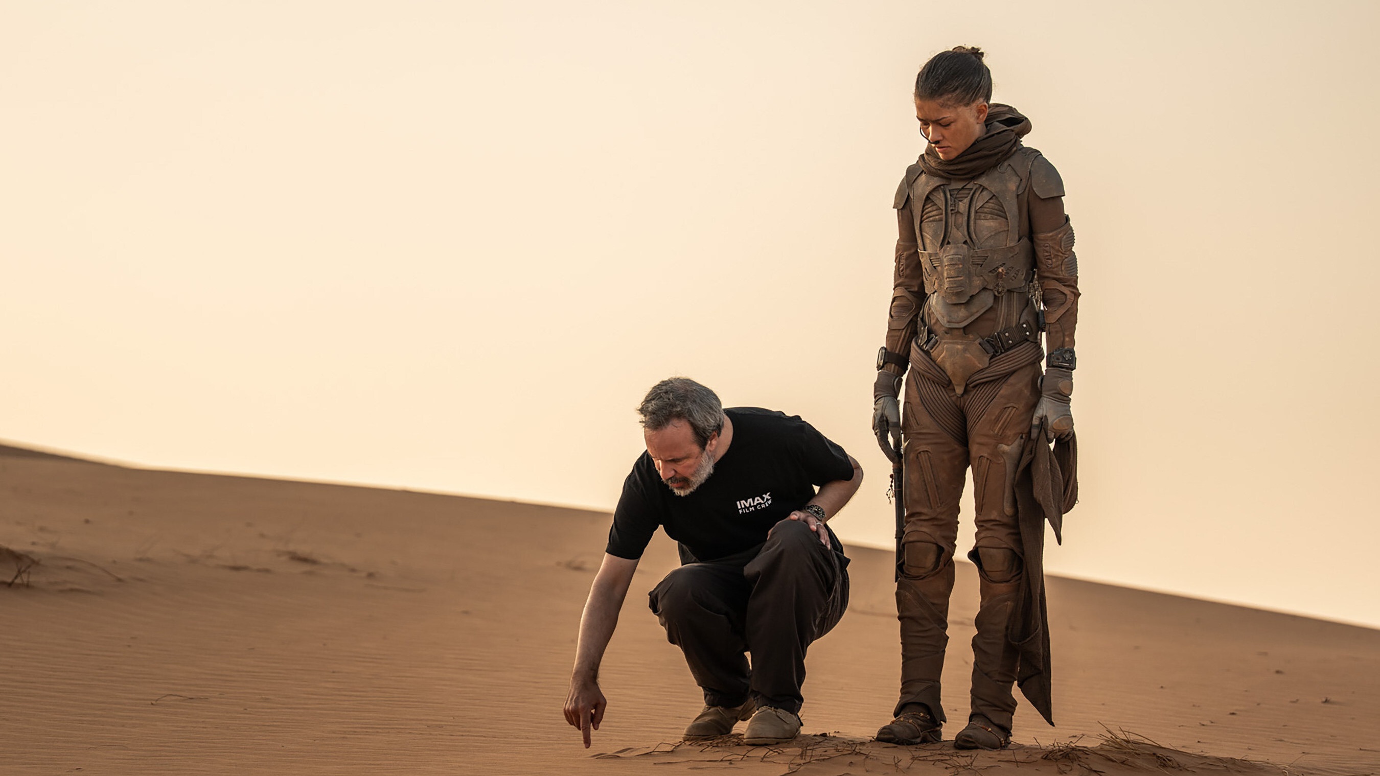 Zendaya and Denis Villeneuve on the set of Dune: Part Three in Abu Dhabi's Liwa Desert.