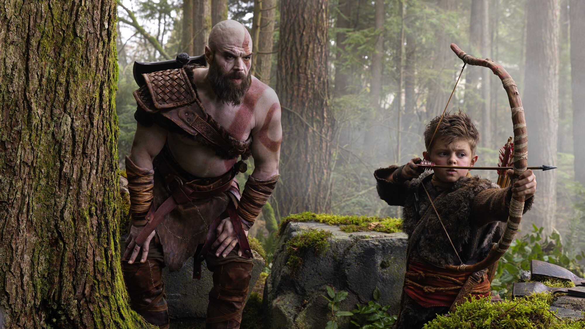 Ryan Hurst as Kratos stands beside Callum Vinson as Atreus in Prime Video's live-action God of War series.