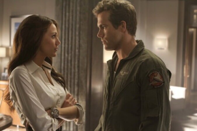 Ryan Reynolds as Hal Jordan and Blake Lively as Carol Ferris in Green Lantern (2011).