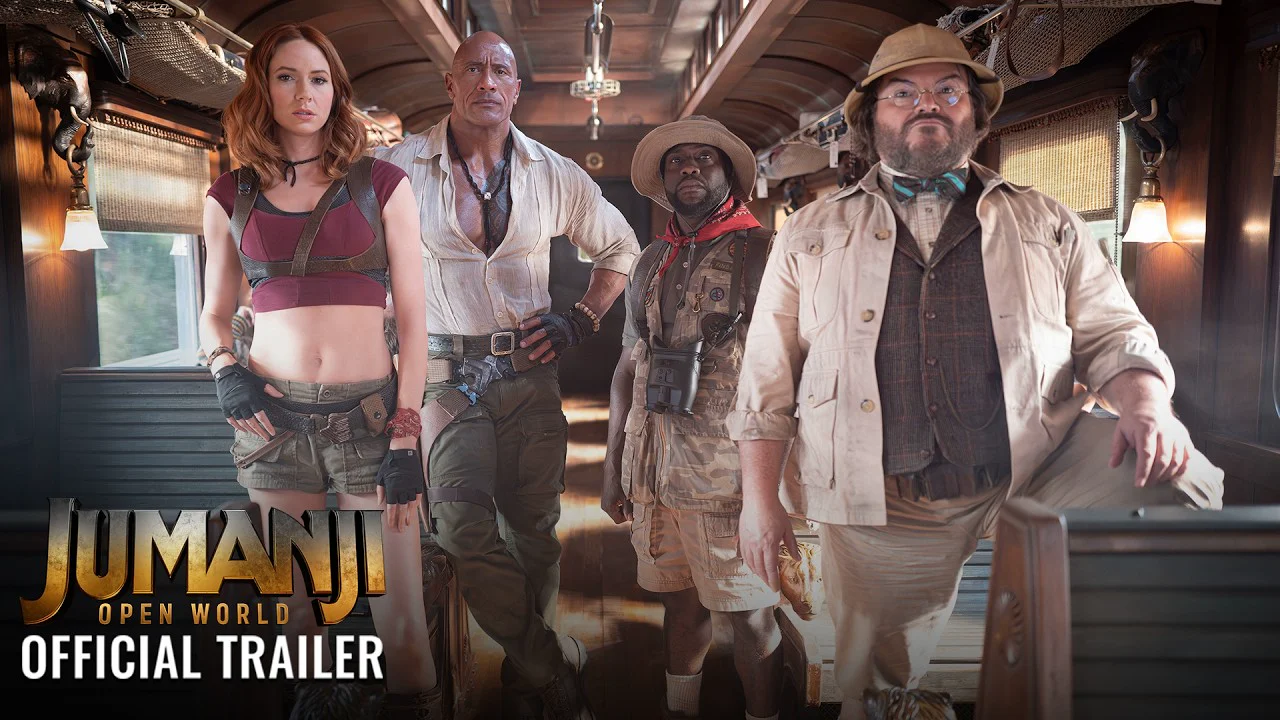 Karen Gillan as Ruby Roundhouse, Dwayne Johnson as Dr. Smolder Bravestone, Kevin Hart as Mouse Finbar and Jack Black as Professor Shelly Oberon in a train car in the official Jumanji: Open World trailer.