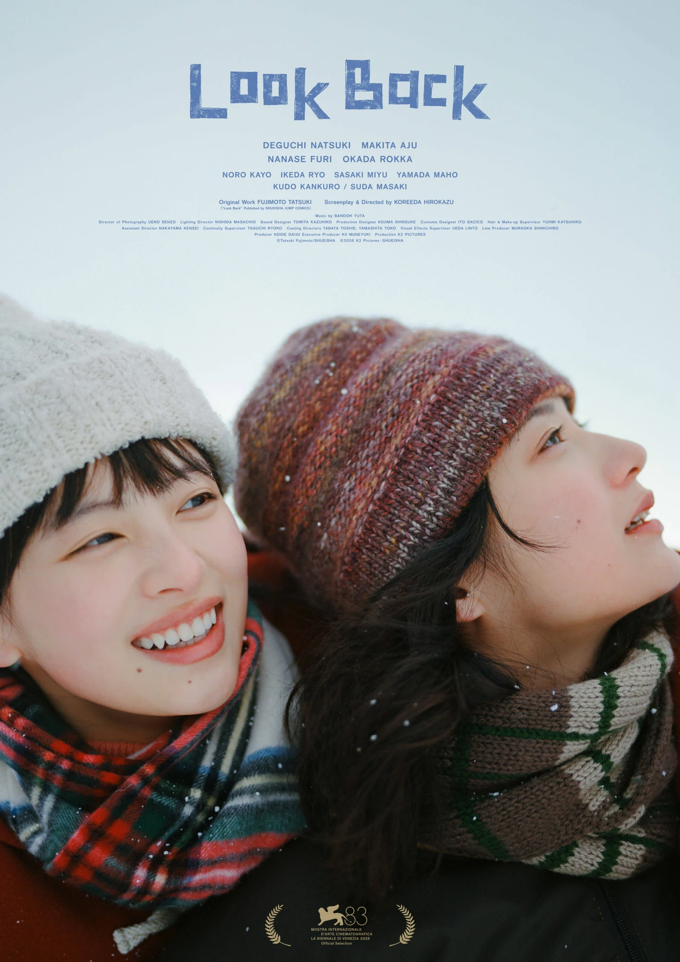 Official poster for the live-action Look Back film showing Fujino and Kyomoto lying in the snow, with the film's Venice Film Festival Official Selection laurel.