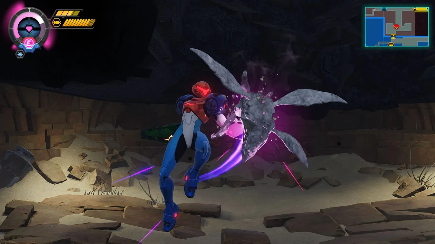 Metroid Ravenous gameplay screenshot showing Samus draining pink energy from a winged enemy in a dark underground cavern, with her energy meter visible in the HUD.