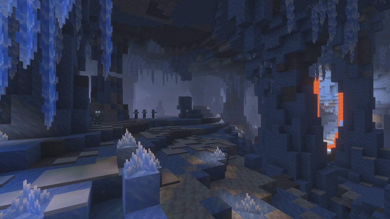 An official Minecraft preview of an ice cave with hanging icicles, glowing crystals and mobs.