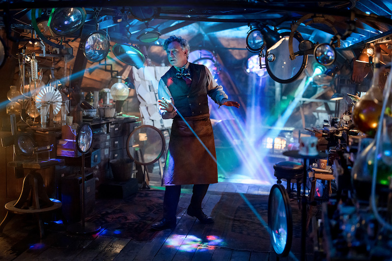 Daniel Craig as Uncle Andrew in a room filled with equipment in Netflix's Narnia first look.