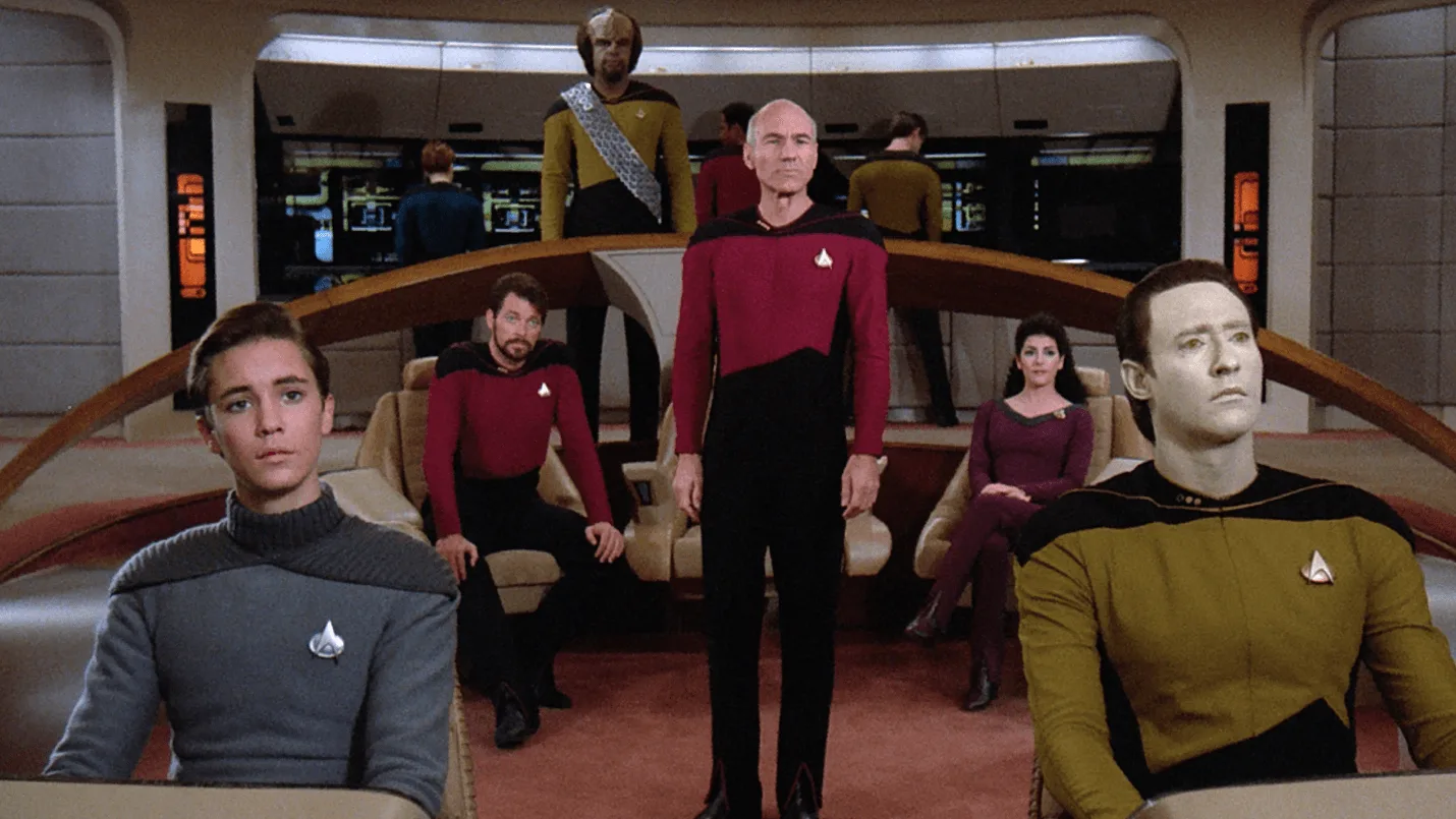 The Star Trek: The Next Generation bridge crew gathered in promotional artwork.