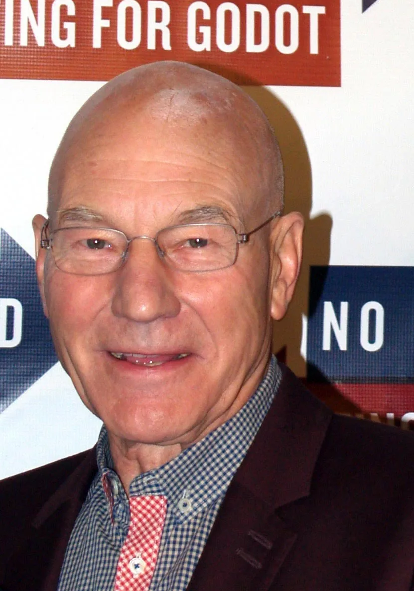 Patrick Stewart at a New York press event in front of a Waiting for Godot and No Man's Land backdrop.