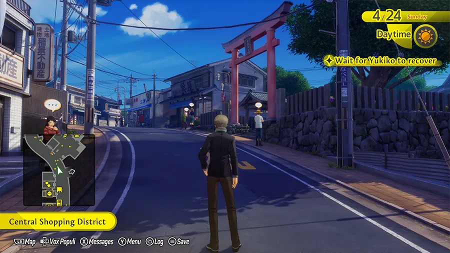 The protagonist walks through Inaba's Central Shopping District in Persona 4 Revival.