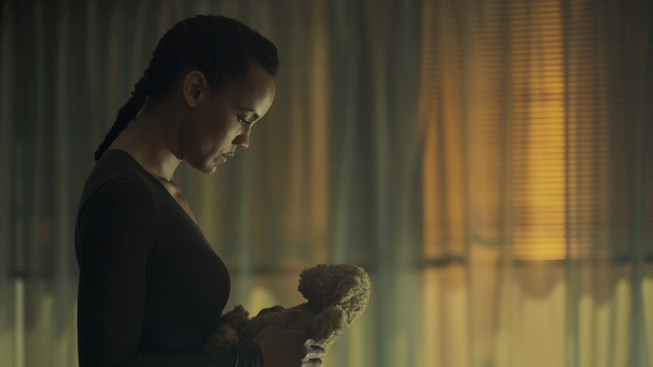 Maria Sten as Frances Neagley holding a teddy bear in Prime Video's Neagley.