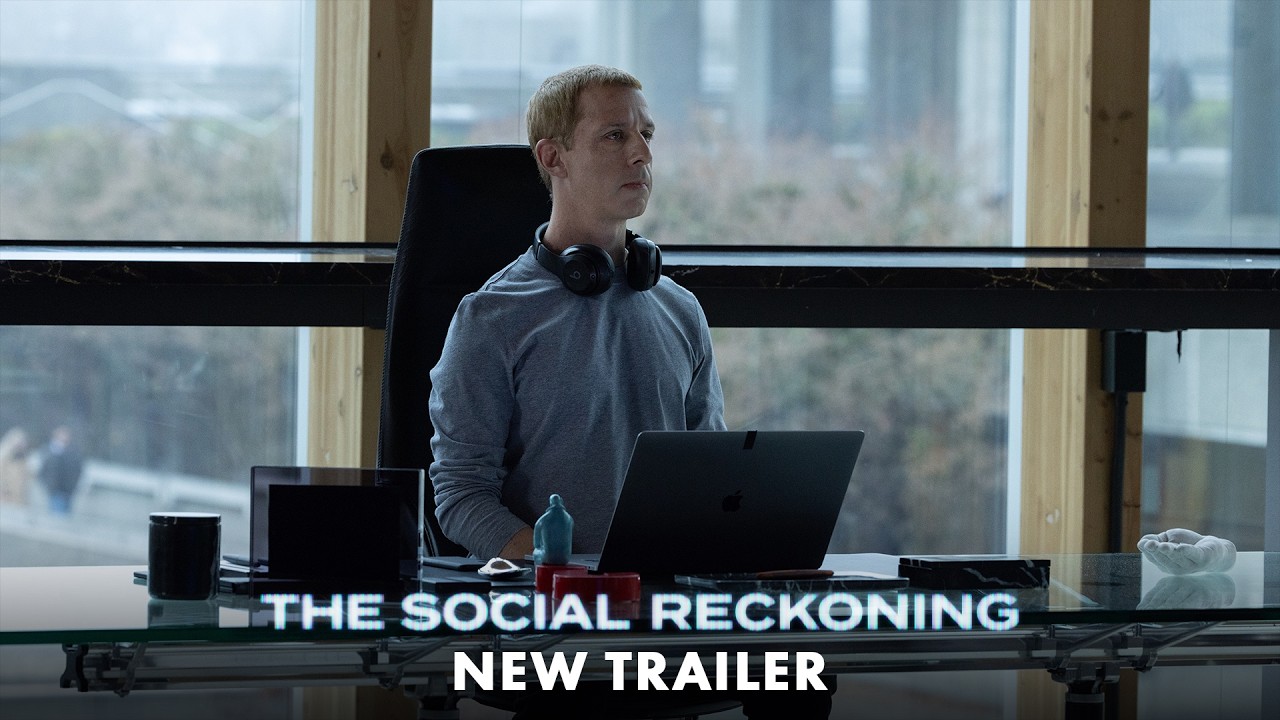 Jeremy Strong as Mark Zuckerberg at a desk in Sony's trailer for The Social Reckoning