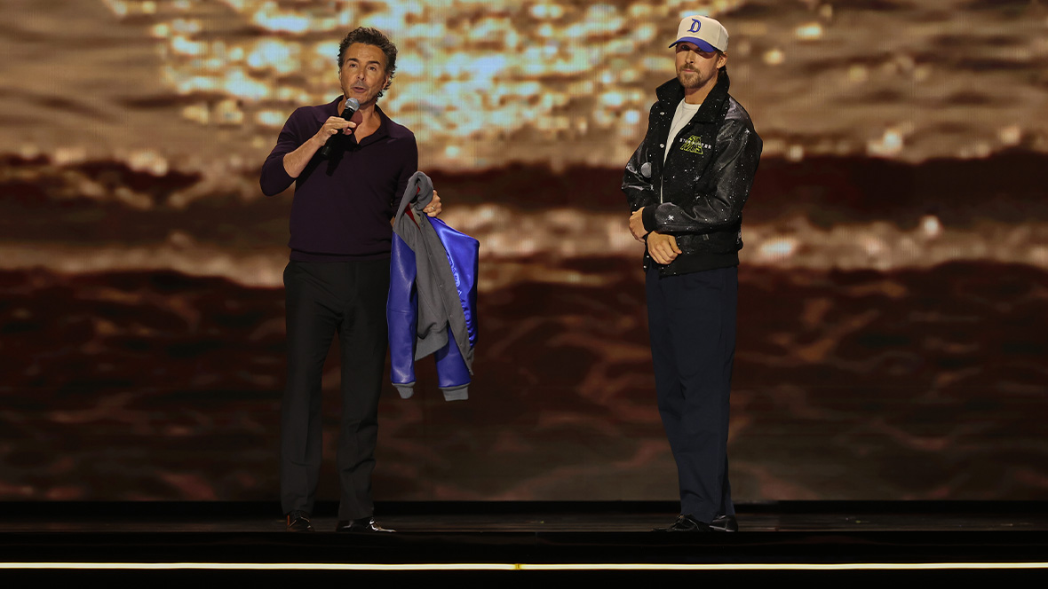 Star Wars: Starfighter director Shawn Levy and Ryan Gosling onstage during the D23 Disney Entertainment Showcase.