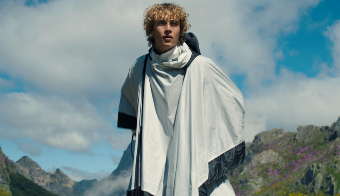 A District 12 tribute standing in the mountainous Quarter Quell arena in Sunrise on the Reaping.