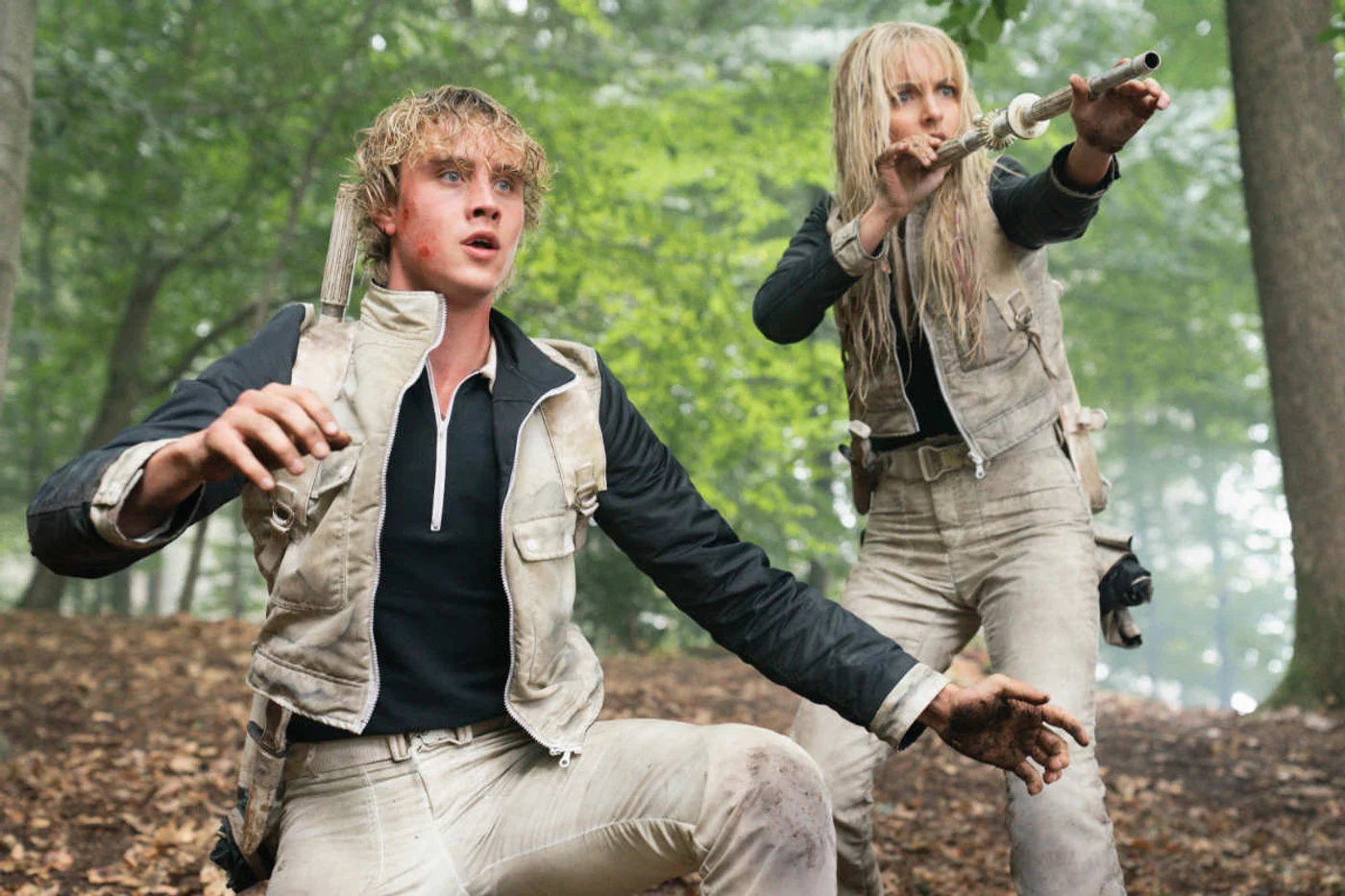 Joseph Zada as young Haymitch Abernathy and Mckenna Grace as Maysilee Donner in the arena in Sunrise on the Reaping.