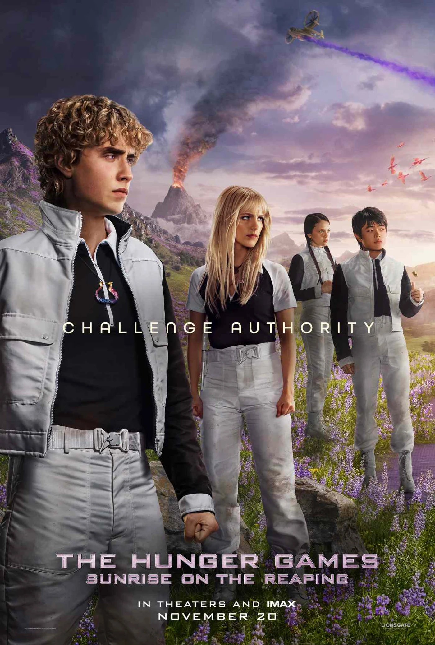 Official Sunrise on the Reaping poster showing Haymitch Abernathy and fellow District 12 tributes in the Quarter Quell arena, with the tagline Challenge Authority.