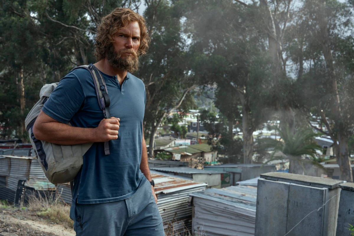 Chris Pratt as James Reece on a mission in an African township setting in The Terminal List Season 2.