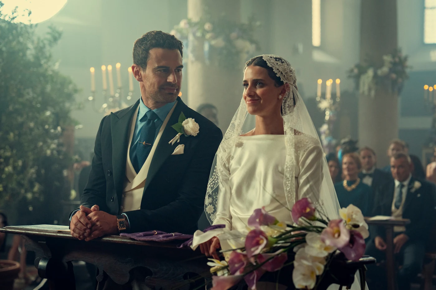 Theo James as Eddie Horniman and Benedetta Porcaroli as Bella at their wedding ceremony in The Gentlemen Season 2.