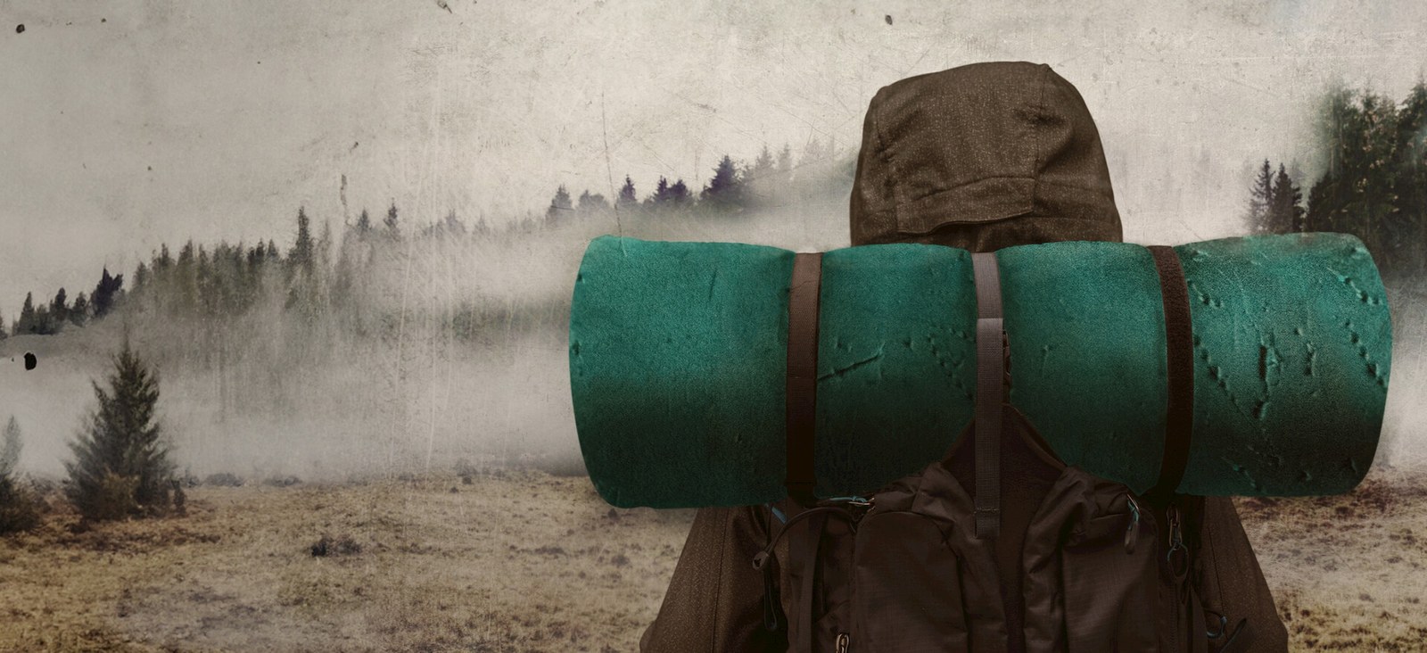 Official Netflix promotional art for The Ritual, showing a lone hiker facing a fog-covered forest.