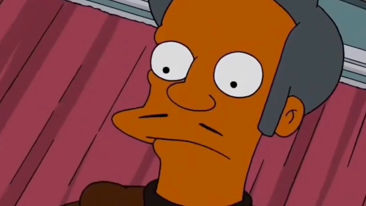 Apu Nahasapeemapetilon in an animated close-up from The Simpsons.