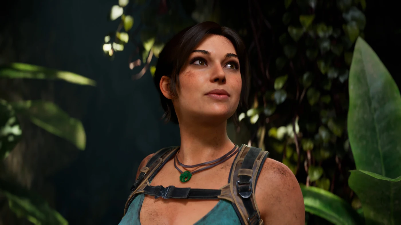 Crystal Dynamics / Amazon Games Lara Croft in close-up while exploring jungle ruins in Tomb Raider: Legacy of Atlantis.