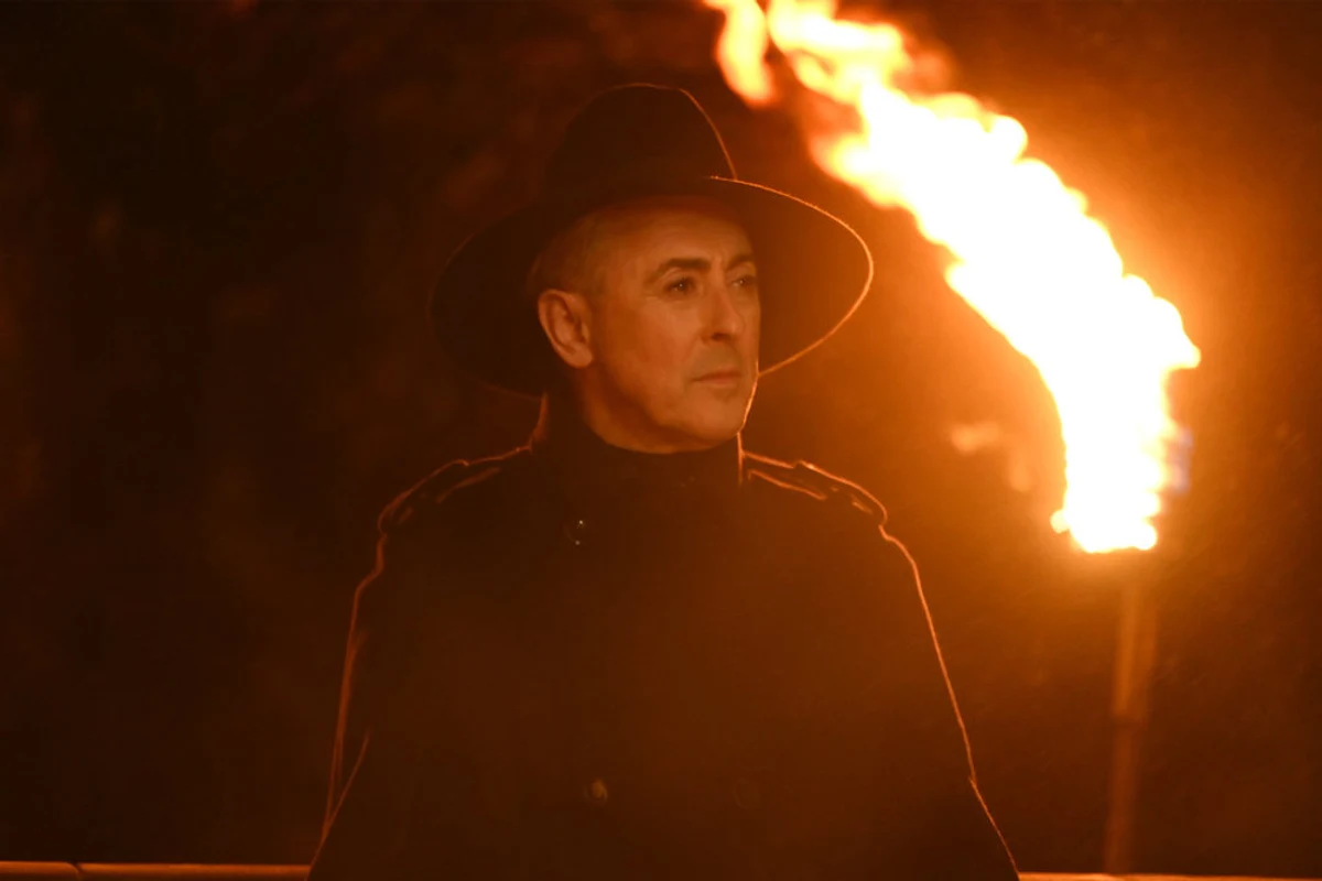 Alan Cumming as the host of The Traitors, an official Peacock press photo from the series.