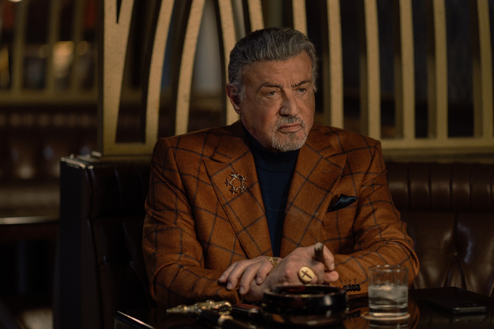 Sylvester Stallone as Dwight Manfredi in Tulsa King Season 4.