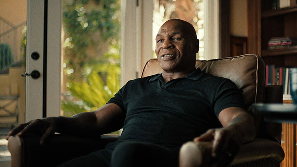 Mike Tyson seated for a present-day interview in the official TYSON Netflix documentary trailer.