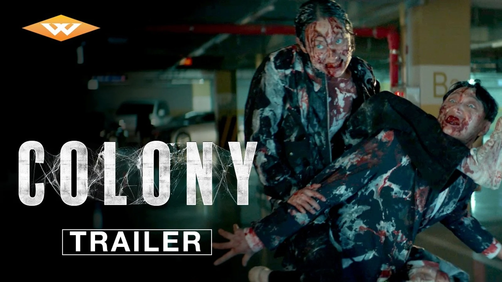 Official Colony trailer title card showing two blood-covered infected characters in a parking garage.
