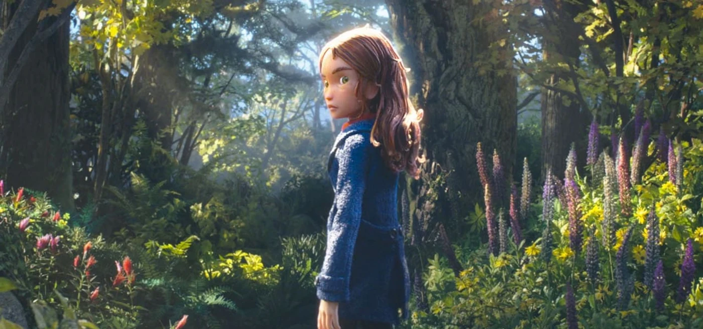 Prue McKeel standing alone in a wildflower clearing in the Impassable Wilderness in LAIKA's Wildwood.