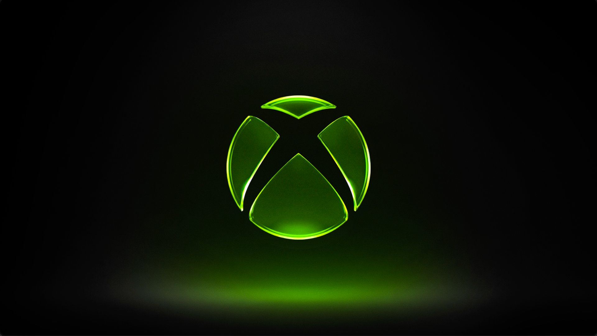 Official glowing green Xbox logo on a black background